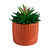 Groene kunstplant en pot in cement (terracotta)