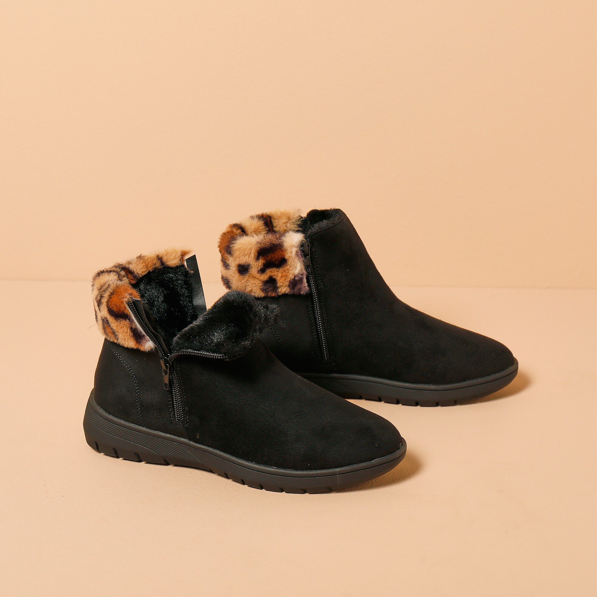 Gevoerde boots met rits en bedrukte bontrand, zwart | Blancheporte