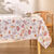 Nappe anti-taches motif bouquets de fleurs (blanc / rouge)