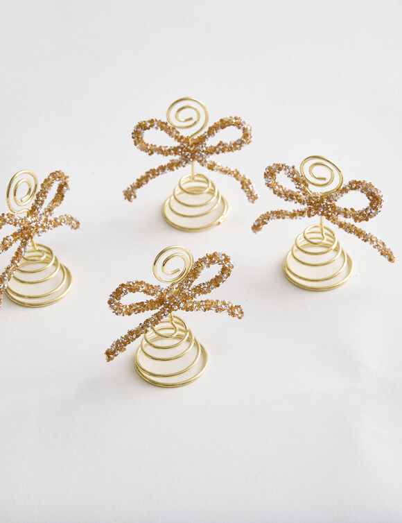 Naamkaartjes in de vorm van een strik &ndash; set van 4 (goudkleurig)