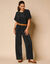 Effen, ruime broek, plissétricot (zwart)