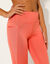 Legging met hoge taille en pasjes in nettricot (koraal)