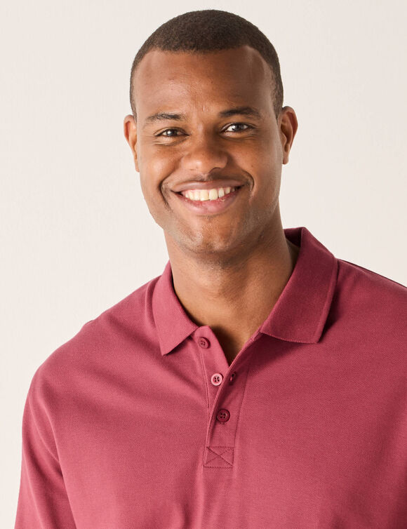 Polo uni maille piqu&eacute;e manches longues (rose fonc&eacute;)