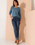 Vest met knopen, ronde hals en geschulpte afwerking, ajourtricot (jeansblauw)