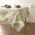 Tafellaken in toile cirée, met bladerenprint (groen / beige)