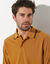 Effen polo in piquétricot met lange mouwen (honing)