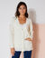 Lang vest met knopen in patenttricot (gebroken wit)