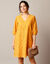 Jurk met broderie anglaise en 3/4-mouwen (saffraangeel)
