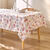 Nappe anti-taches motif bouquets de fleurs (blanc / rouge)