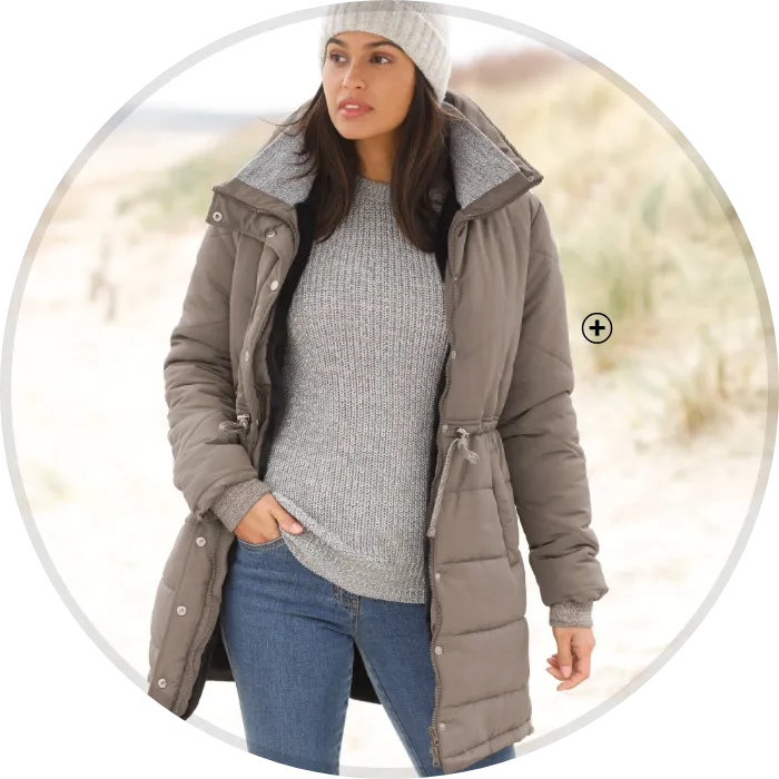 Lange waterdichte donsjas met capuchon en verticale stiksels die het silhouet structureren en verfijnen – Blog Blancheporte