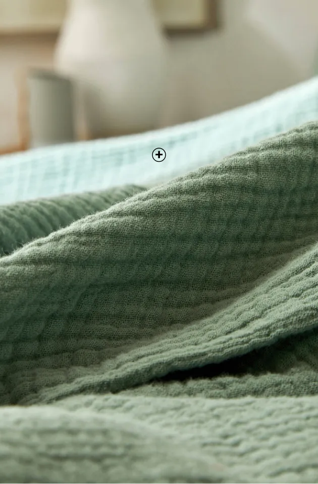 Close-up van dekbedovertrek materiaal in driedubbel katoengazen – luchtig en licht comfort | Blancheporte