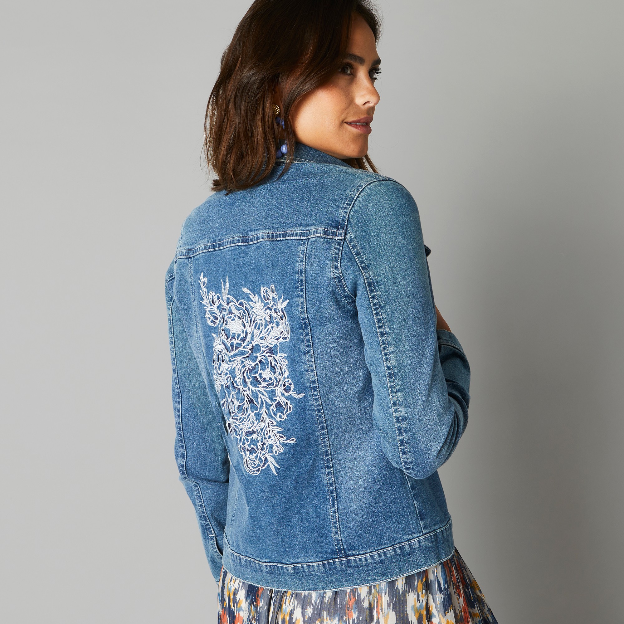 Veste en jean blanche porte sale